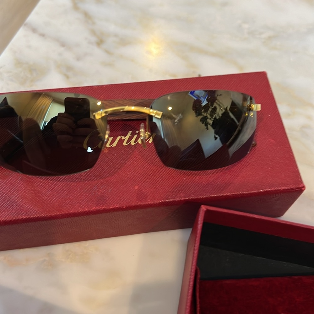 Cartier rimless wood wood frame sunglasses